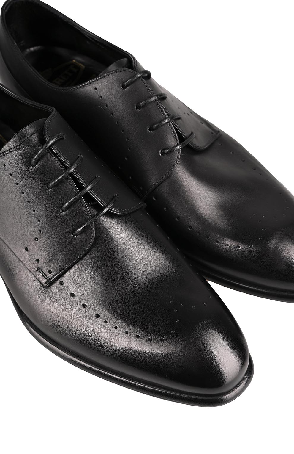 Кожаные дерби с перфорированным узором