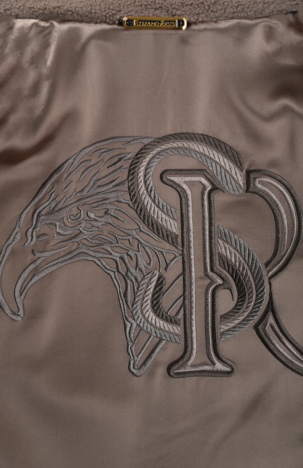 Куртка-бомбер из кожи ягнёнка с декором из овчины