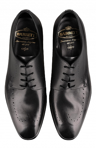 Кожаные дерби с перфорированным узором