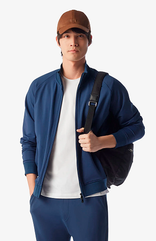 Спортивный костюм из эластичного хлопка и нейлона синего цвета