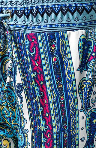 Расклешенные брюки с узором пейсли