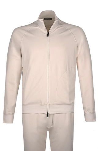 Спортивный костюм из эластичного хлопка и нейлона сливочного цвета